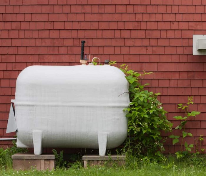 Heating Fuel Oil Tank Beside Exterior Wall.